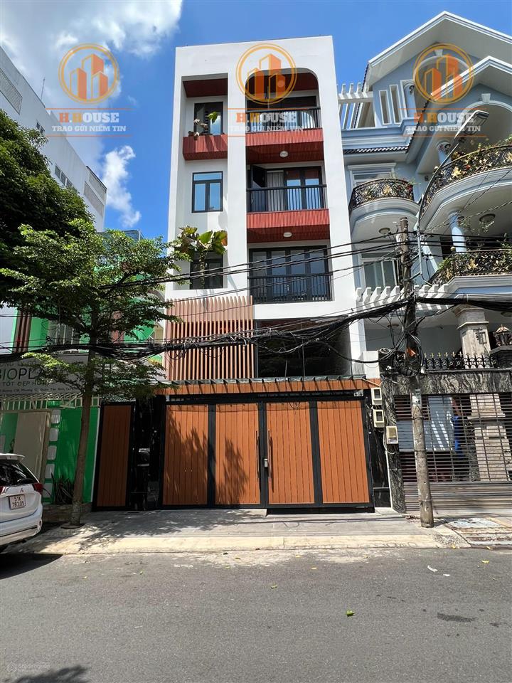 Cho thuê tòa nhà mới văn phòng sd 500m2 k300, sân bay giá 50tr, hầm 5 tầng