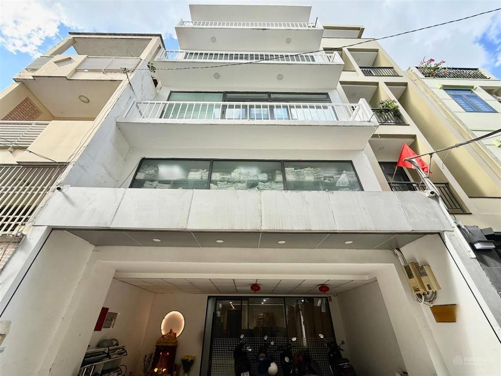 Toà nhà văn phòng huỳnh văn bánh, phú nhuận xe hơi ngủ trong nhà 6 tầng thang máy