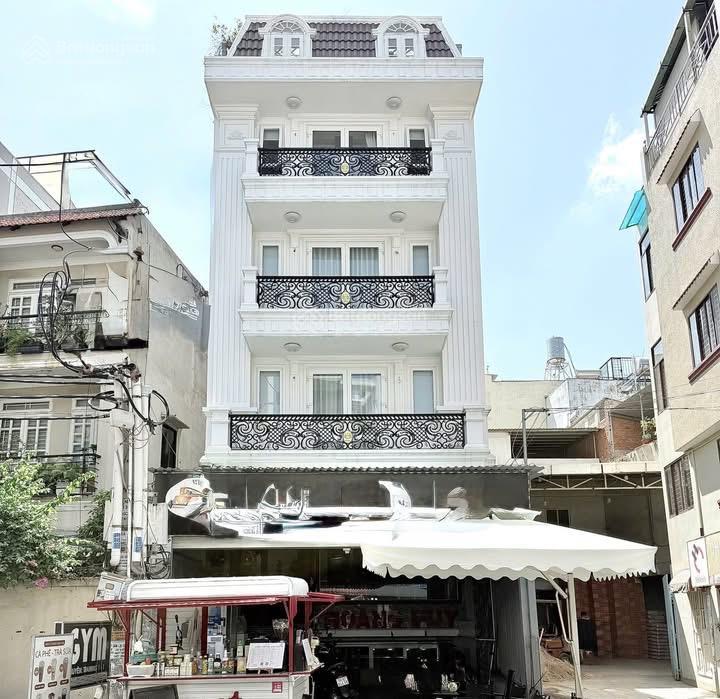 Building mặt tiền vừa ở vừa kinh doanh ngay chợ tân sơn nhất, cc hà đô  sát bên sân bay  130m2