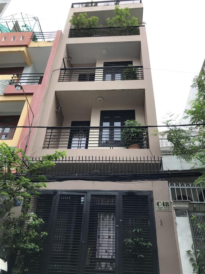 Nhà hẻm thông xe hơi dương quảng hàm p5  gv, sau siêu thị emark, dt 4x15m, 1 trệt 2 lầu st, 8 tỷ