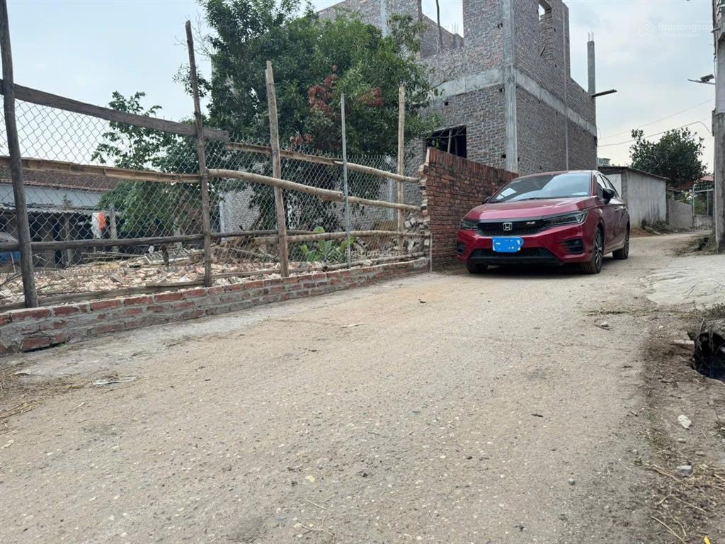 Bán lô đất 100 m2 full thổ cư, mt = mh = 5,6 m, hai mặt tiền, 25tr/m2