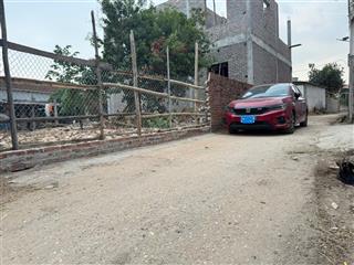 Bán lô đất 100 m2 full thổ cư, mt = mh = 5,6 m, hai mặt tiền, 25tr/m2