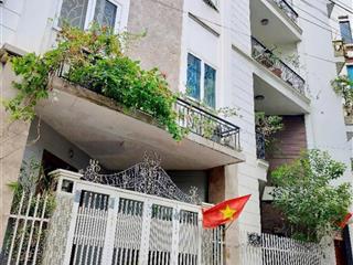 Bán nhà mặt phố âu cơ gần hồ tây  dt 105m2 x 4 tầng  mặt tiền 6.5m  vỉa hè  kinh doanh  30 tỷ
