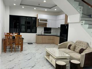 Cần bán nhà phố đường 12 m sổ đỏ cầm tay