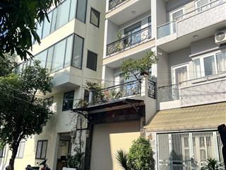 Bán nhà đường số quận 7.ngang 4m dài 20m.4 tầng.giá bán 12,8ty