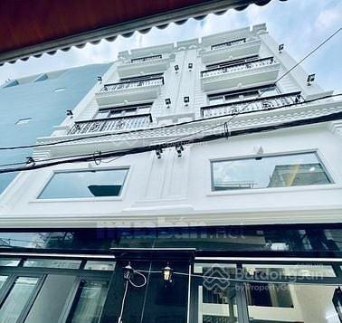 Bán tòa nhà chdv ngay liên khu 45 chợ bình thành 315m2  56p xây mới 100% giá 25,5 tỷ
