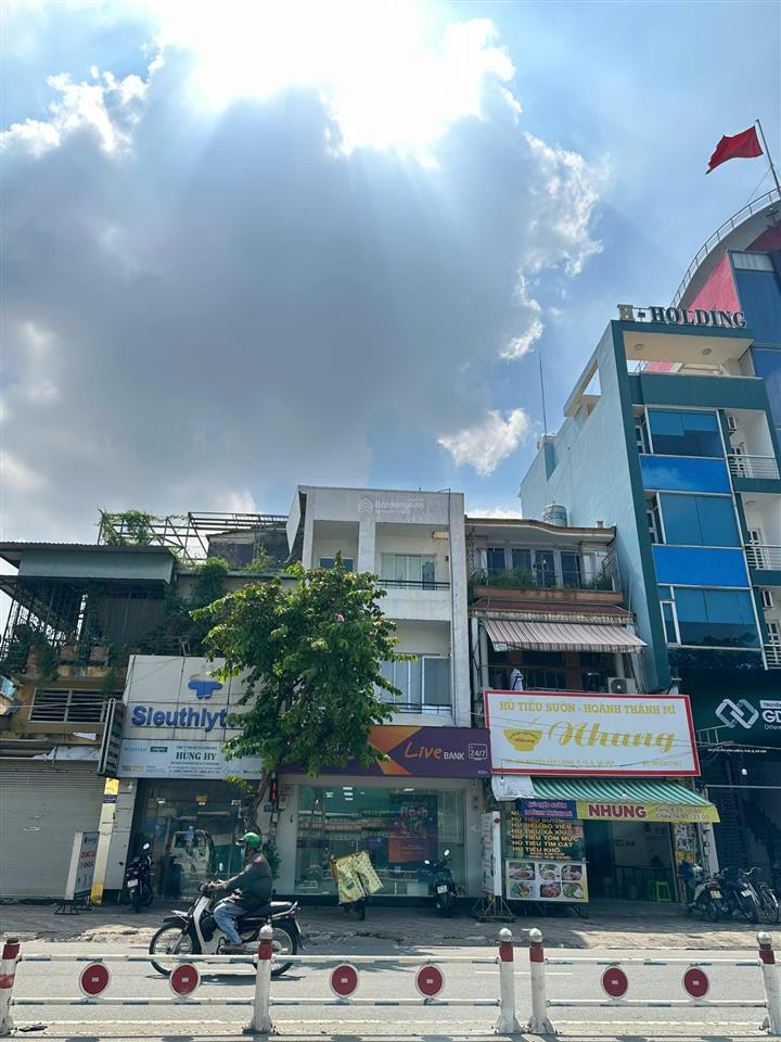 Bán mt quang trung p11 đối diện chợ hạnh thông tây dt 6.4x27m, 2 lầu hđt 60tr/tháng. giá 26.9 tỷ