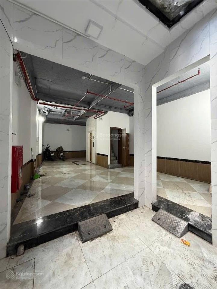 18 phòng ngủ  7 tầng thang máy  100tr/tháng  phố trương định