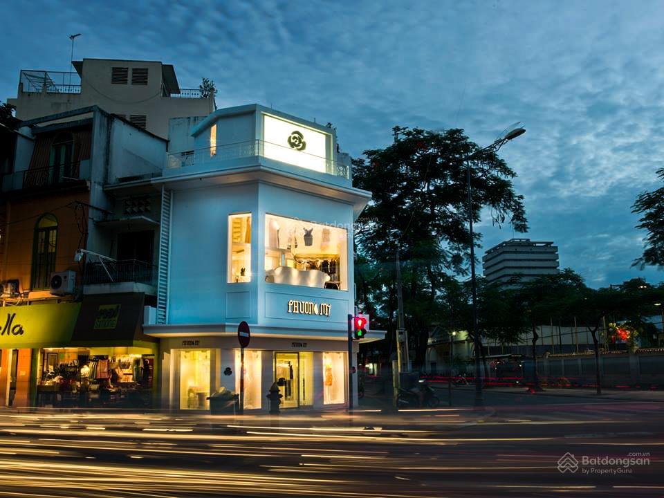 Tòa nhà góc 2 mt lê thánh tôn, bến nghé, quận 1. dt 8x20m. trệt 4 lầu thang máy