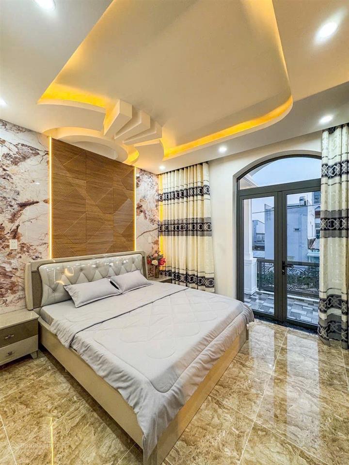 Siêu phẩm nhà hxh 7 chỗ nguyễn văn đậu, bình thạnh  nhà mới hoàn công đủ, sát mặt tiền đường