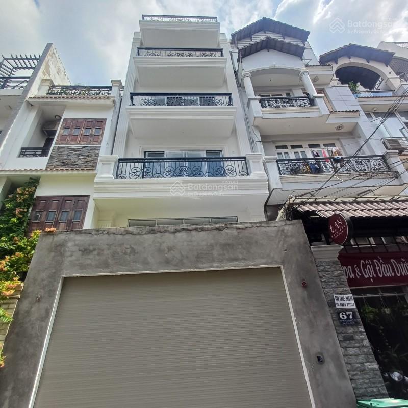 Bán nhà mặt tiền 65 hiệp nhất phường 4 tân bình, trục cmt8 (4,95 x 17m), 5 tầng  15,79 tỷ
