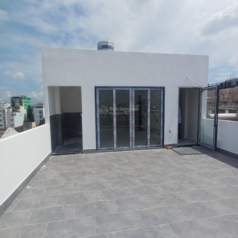 Bán nhà mặt tiền 65 hiệp nhất phường 4 tân bình, trục cmt8 (4,95 x 17m), 5 tầng  15,79 tỷ