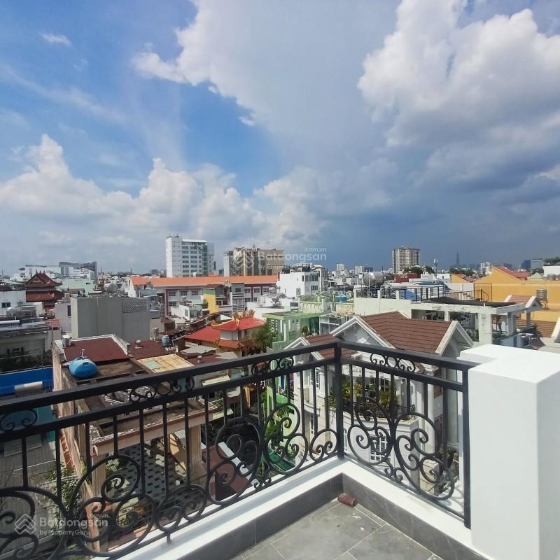 Bán nhà mặt tiền 65 hiệp nhất phường 4 tân bình, trục cmt8 (4,95 x 17m), 5 tầng  15,79 tỷ