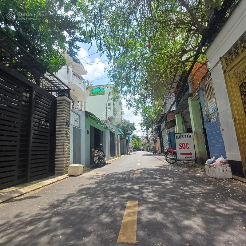 Bán nhà mặt tiền 65 hiệp nhất phường 4 tân bình, trục cmt8 (4,95 x 17m), 5 tầng  15,79 tỷ