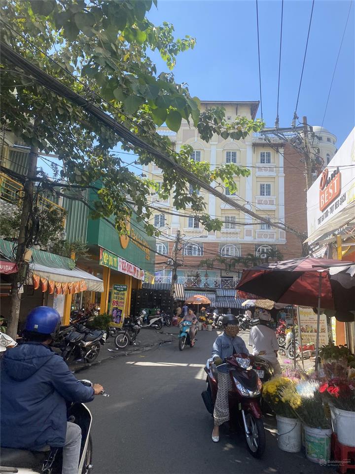 Bán nhà mặt tiền tân bình, gần chợ sầm uất, p. 10 tân bình, trục lạc long quân, 4*12m, 2 tầng