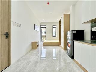 Cho thuê chdv studio mới 100% full nội thất tòa nhà thang máy hầm xe gần chợ bà chiểu