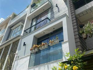 Nhà mới lê quang định ô tô ngủ trong nhà, phường 7, q. bình thạnh dt 4,5x16m 4pn 5wc giá 12,x tỷ