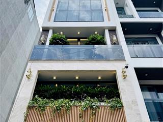 Nhà mới siêu đẹp 5 lầu đường thông phan huy ích