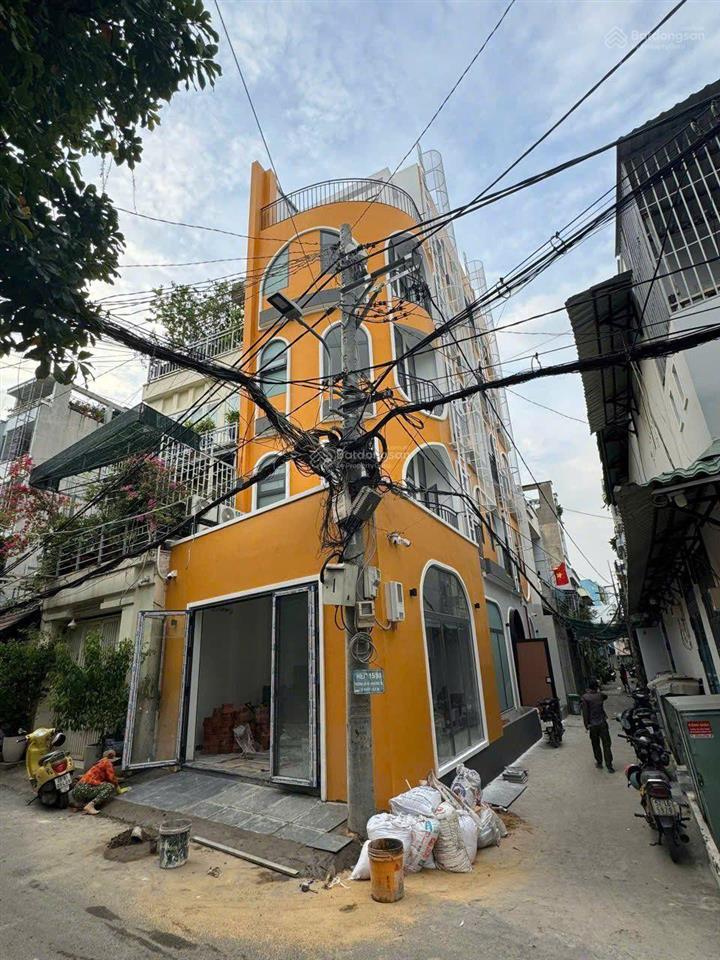 Lô góc căn hộ dịch vụ 5 tầng hxh 6m có 15p full nội thất cao cấp ngang gần 6m thu nhập 70tr/th