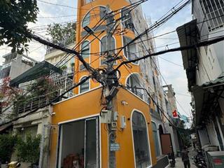 Lô góc căn hộ dịch vụ 5 tầng hxh 6m có 15p full nội thất cao cấp ngang gần 6m thu nhập 70tr/th