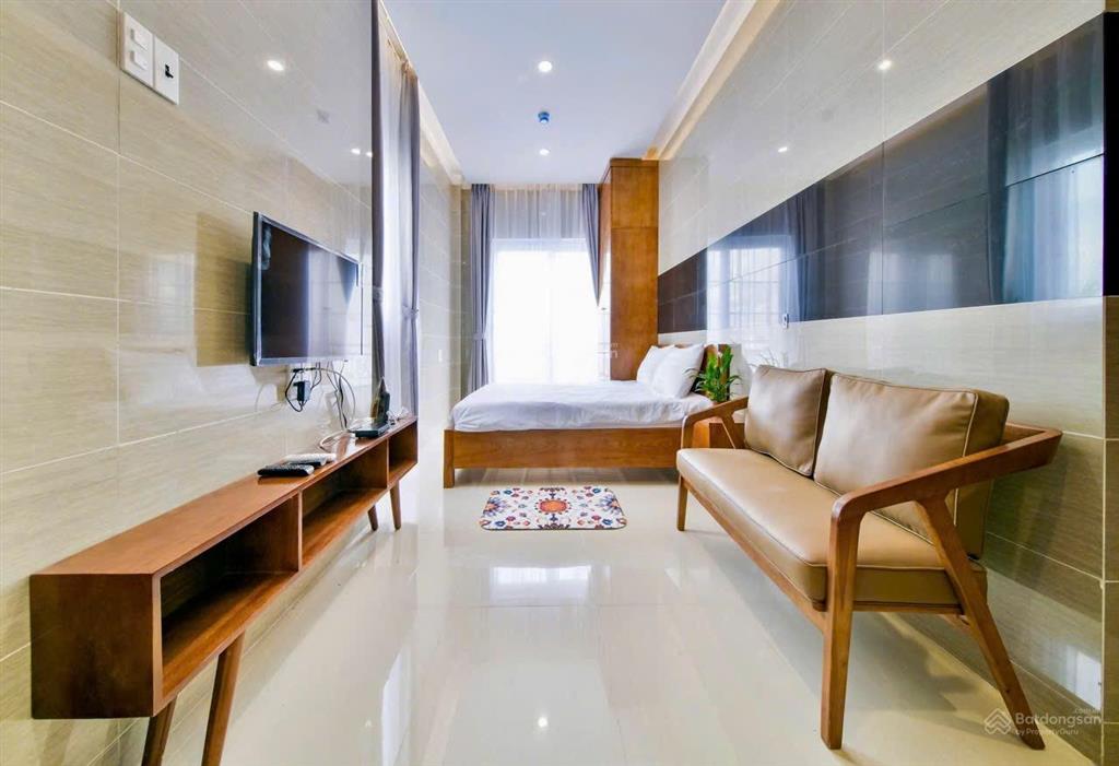 Cho thuê căn hộ mới 40m2, full nt, phùng văn cung. toà thang máy, bãi xe rộng, có dv dọn phòng