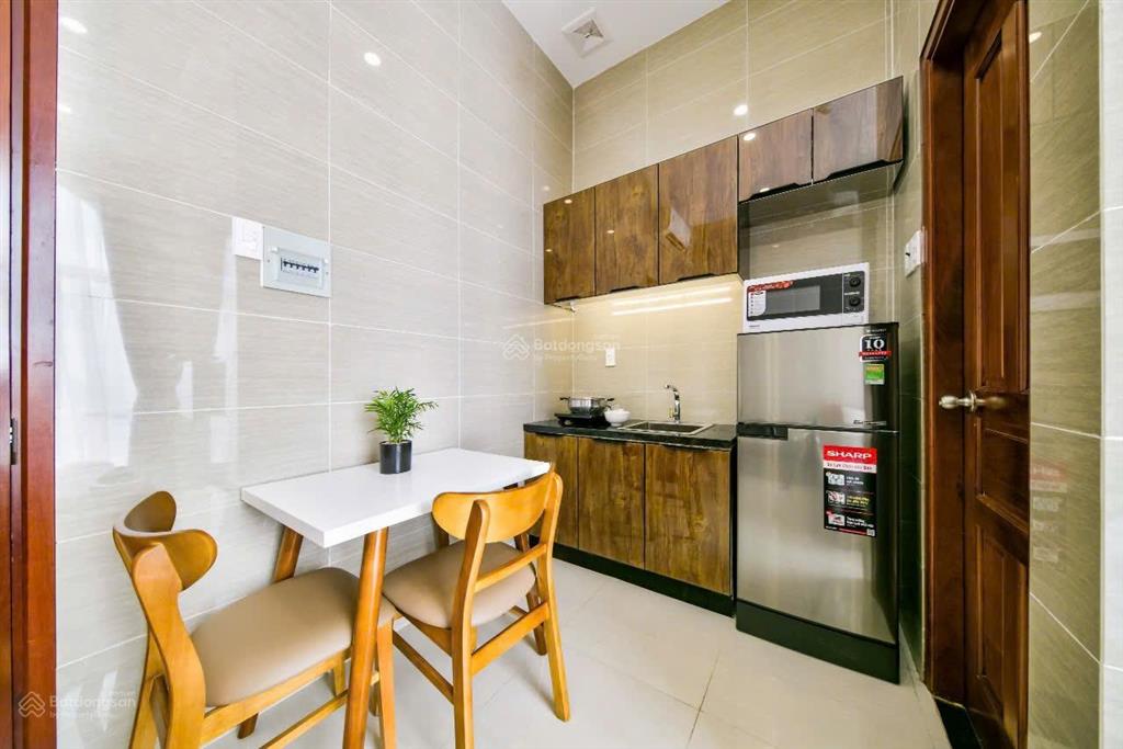 Cho thuê căn hộ mới 40m2, full nt, phùng văn cung. toà thang máy, bãi xe rộng, có dv dọn phòng