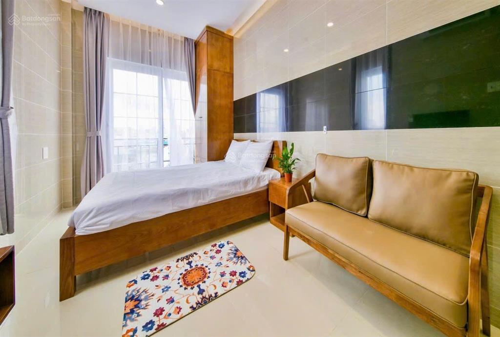 Cho thuê căn hộ mới 40m2, full nt, phùng văn cung. toà thang máy, bãi xe rộng, có dv dọn phòng