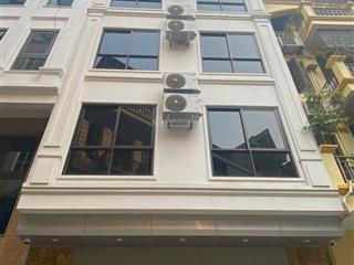 Cho thuê nhà láng hạ  đống đa 65m x 7t thông sàn,thang máy,thoáng trước sau hợp vp,ttta giá 42tr
