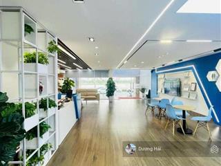 Bán tòa nhà văn phòng mặt phố hoàng cầu đống đa  240m 9 tầng  view hồ dòng tiền 3 tỷ/năm