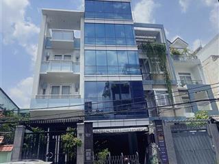 Tòa nhà mt 5a đồng nai, p2, tân bình  thang máy  hầm  4 lầu