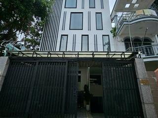 Cho thuê tòa nhà mặt tiền 23 phổ quang, tân bình, 8x20m  hầm  4 lầu