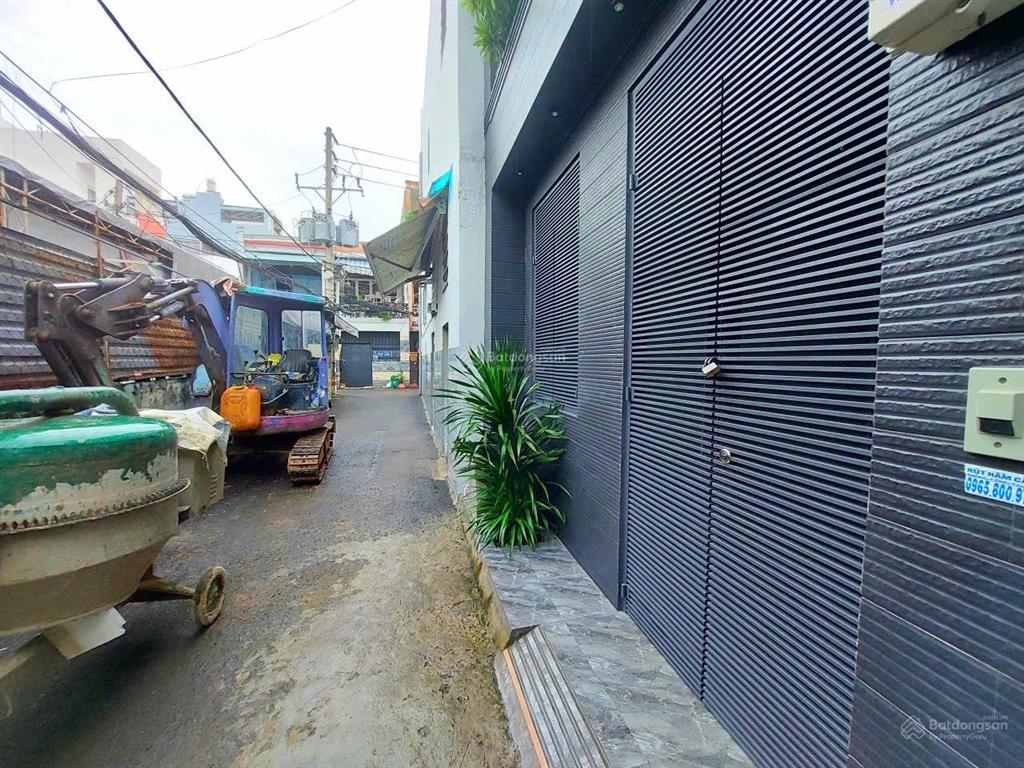 Nhà xây mới 3 lầu 32m2 hẻm xe hơi đường lê văn thọ, ngay công viên làng hoa.