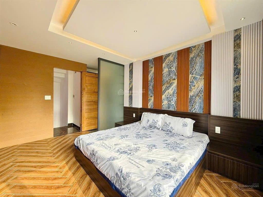 Nhà xây mới 3 lầu 32m2 hẻm xe hơi đường lê văn thọ, ngay công viên làng hoa.