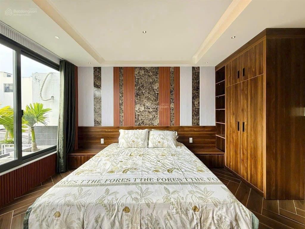Nhà xây mới 3 lầu 32m2 hẻm xe hơi đường lê văn thọ, ngay công viên làng hoa.