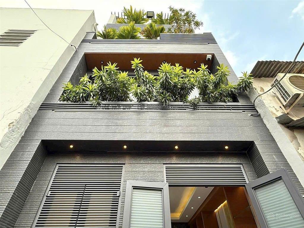Nhà xây mới 3 lầu 32m2 hẻm xe hơi đường lê văn thọ, ngay công viên làng hoa.