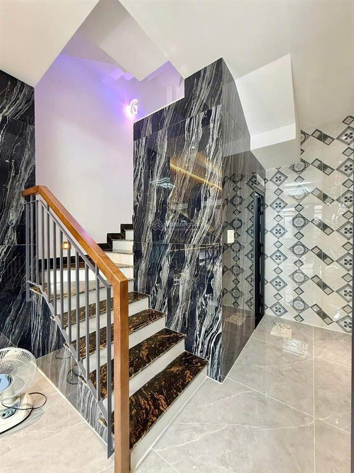 Nhà xây mới 3 lầu 32m2 hẻm xe hơi đường lê văn thọ, ngay công viên làng hoa.