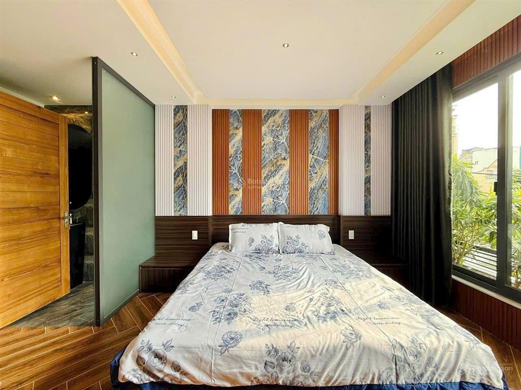 Nhà xây mới 3 lầu 32m2 hẻm xe hơi đường lê văn thọ, ngay công viên làng hoa.