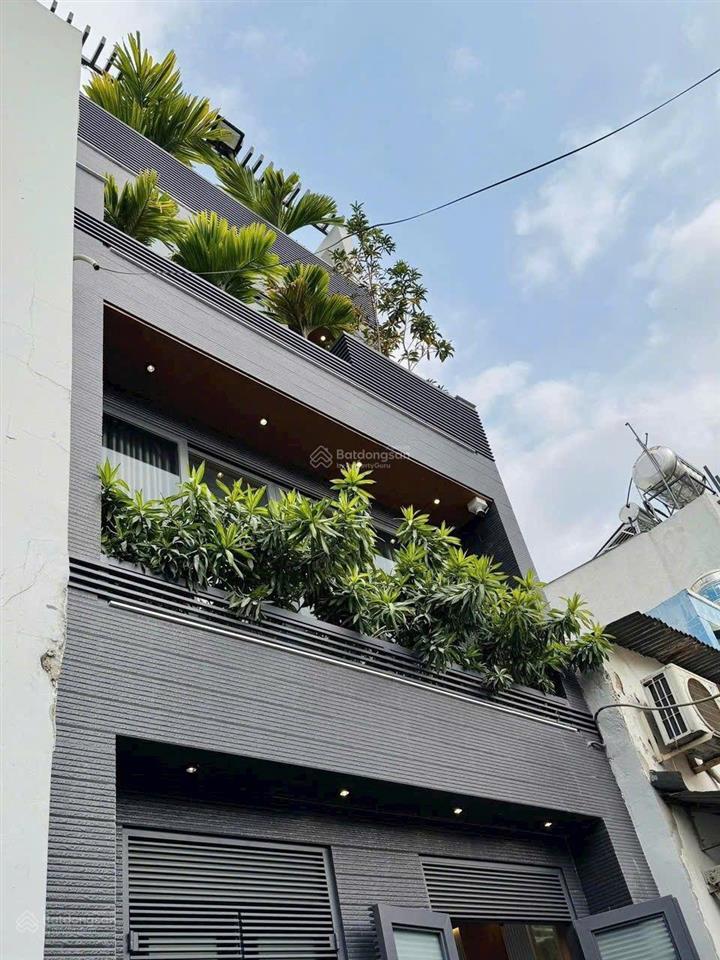 Nhà xây mới 3 lầu 32m2 hẻm xe hơi đường lê văn thọ, ngay công viên làng hoa.