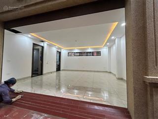 Toà nhà 7 tầng thang máy vip nhất quận đống đa  phố nguyễn chí thanh  ô tô đỗ trong nhà  2 mặt