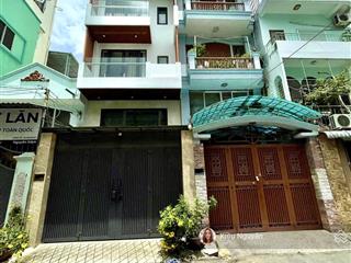 Bán chdv  đối diện bv 175  hxh 8m 5 tầng 9 phòng  doanh thu khủng