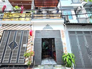 Nhà đẹp, 2 lầu + sân thượng trước  hẻm thông  xe hơi chạy tới nhà  kế quận 7