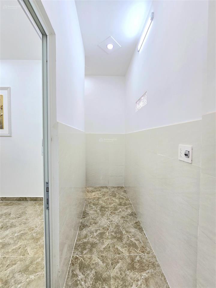 Bán nhà mặt tiền hẻm thông  5mx8m  giáp quận 7