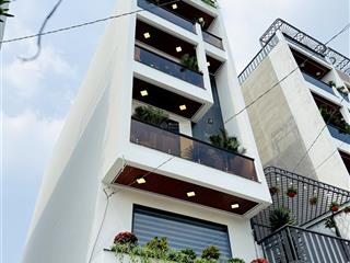 Bán nhà 107m2 có phòng ngủ trệt & ô chờ thang máy xây mới 5 tầng đường 8m, gần đại học gtvt