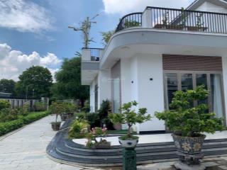 Bán biệt thự góc hai mặt tiền đường nhựa 12m 711m2 ngang 25m x 28,5m nhà 2 tầng 21,5 tỷ.