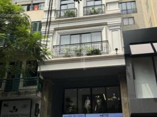 Bán nhà mặt phố đê la thành, dt 90m x 9 tầng, thuê 100 tr/ th, 2 thoáng, giá 45.5 tỷ.