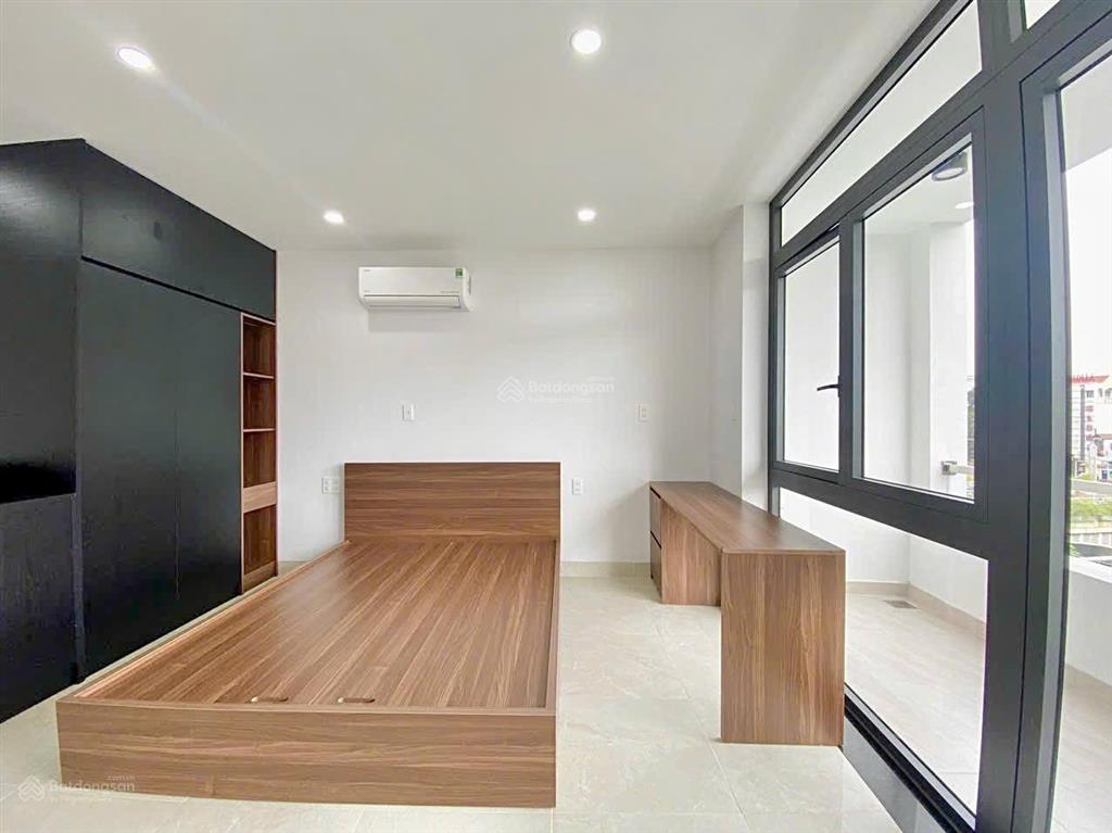 Cho thuê căn hộ mới 100%, full nội thất, ban công, máy giặt riềng, gần toà nhà viettel