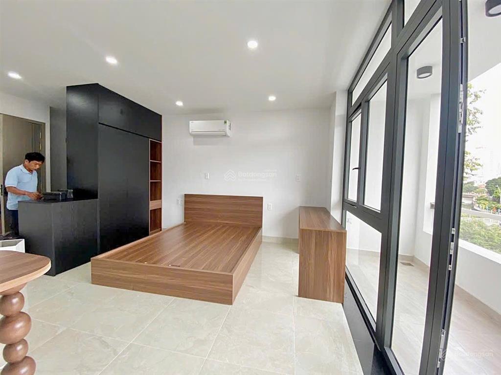 Cho thuê căn hộ mới 100%, full nội thất, ban công, máy giặt riềng, gần toà nhà viettel