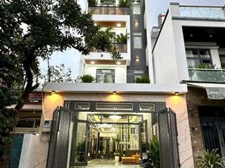 Bán nhà mặt tiền đường tân thới nhất 6. dt 5x23m,4 tầng,có thang máy. giá  12,5 tỷ