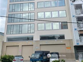 Bán tòa nhà hầm 8 tầng góc 3 mặt tiền đường phan đăng lưu dt 20x35m hđt 1 tỷ/tháng giá 180 tỷ