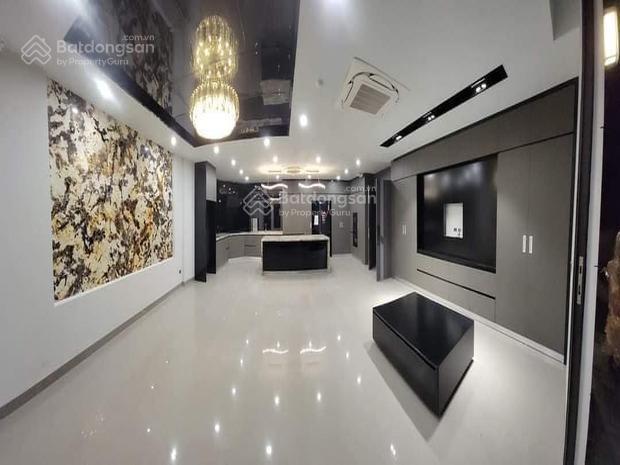 Bán tòa nhà văn phòng mặt phố võng thị, tây hồ, hn  s=134 /220m2  7 tầng. giá 110 tỷ  oto tránh